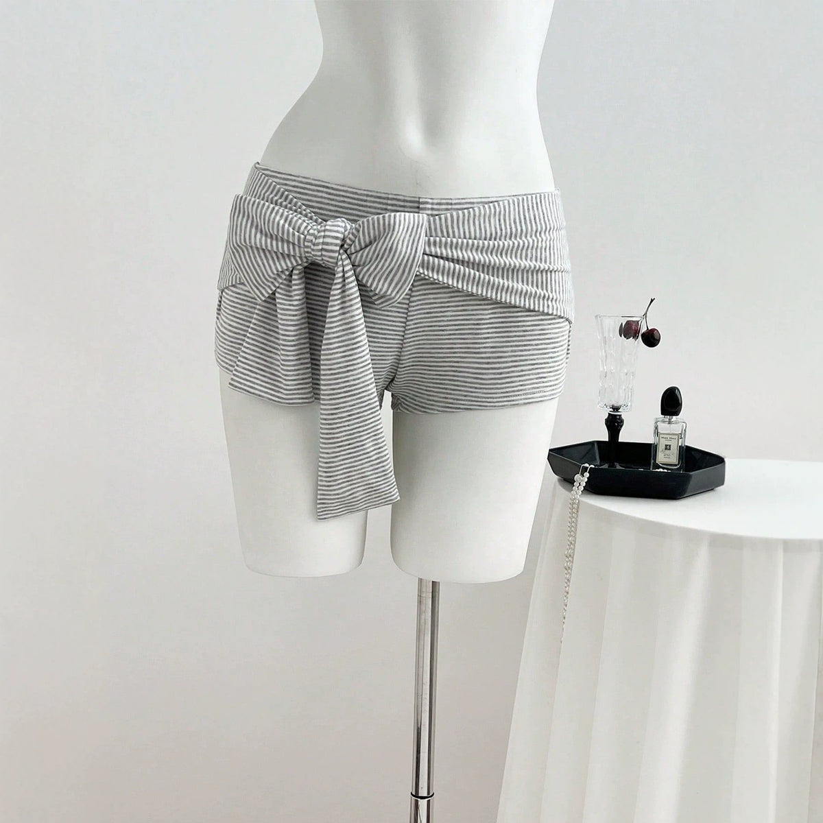 Low waisted striped bow shorts