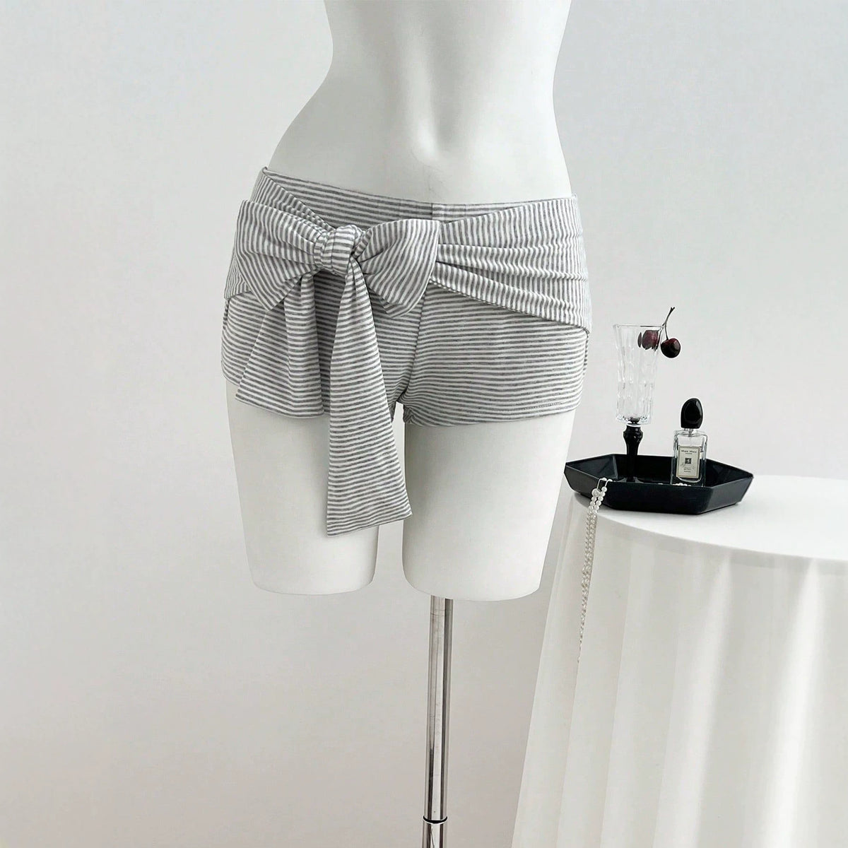 Low waisted striped bow shorts